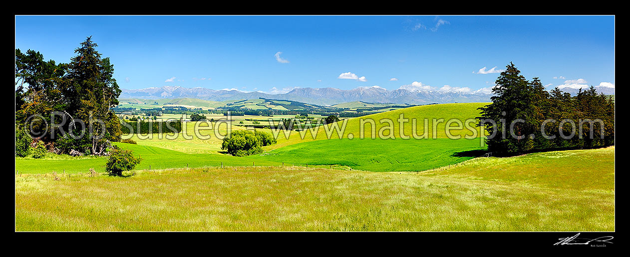 Image of Waikari lush rural farmland panorama with the Puketeraki Range behind, Waikari, Hurunui District, Canterbury Region, New Zealand (NZ) stock photo image