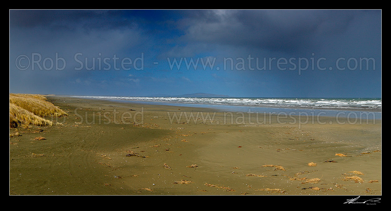 Image of Oreti Beach and sand dunes at Waimatuku Stream mouth, between Invercargill and Riverton. The Bluff hill centre distance. Panorama, Oreti Beach, Southland District, Southland Region, New Zealand (NZ) stock photo image