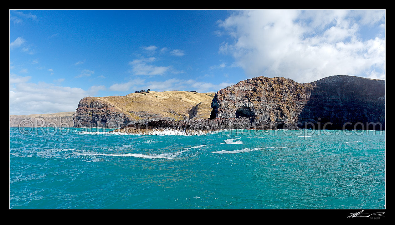 Image of Banks Peninsula, Akaroa harbour entrance (left) and Akaroa Head (with lighthouse), Gateway Point centre and The Amphitheatre at right. Panorama, Banks Peninsula, Christchurch City District, Canterbury Region, New Zealand (NZ) stock photo image