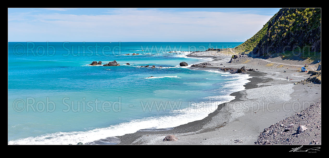 Image of Palliser Bay coast panorama looking south near the Mukamuka Stream. People enjoying summer fishing and diving. Panorama, Ocean Beach, South Wairarapa District, Wellington Region, New Zealand (NZ) stock photo image