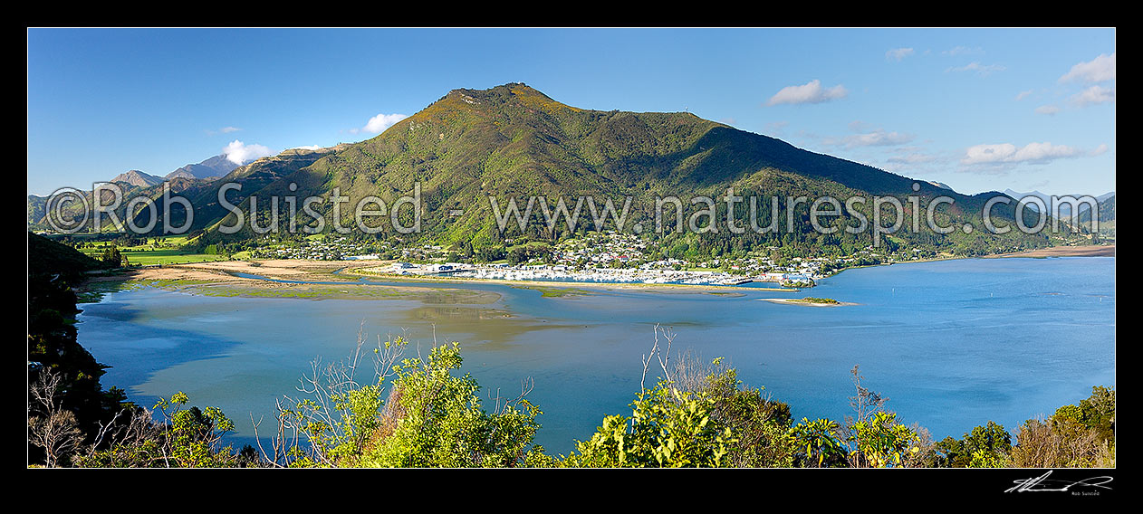 Image of Havelock township, port and marina, with Kaituna River valley far left, and Pelorus River flowing into Pelorus Sound far right. Mt Takorika (721m) above. Panorama, Havelock, Marlborough District, Marlborough Region, New Zealand (NZ) stock photo image