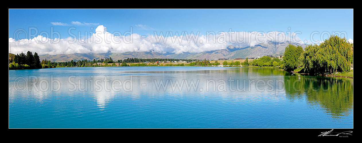 Image of Lake Dunstan, looking up towards the Kawarau River and the Carrick Range. Panorama, Cromwell, Central Otago District, Otago Region, New Zealand (NZ) stock photo image