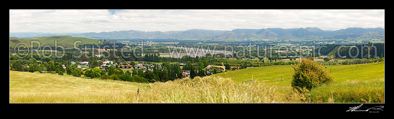 Image of Waiau township beside the Waiau River. Amuri Range behind. Panorama, Waiau, Hurunui District, Canterbury Region, New Zealand (NZ) stock photo image