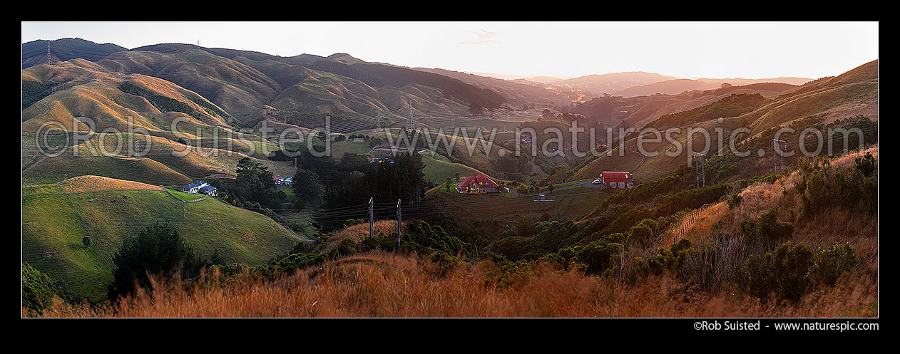 Image of Takapu Valley, looking from head toward Grenada North and SH1 in distance. Belmont Regional Park far right. Takapu Road. Panorama, Tawa, Wellington City District, Wellington Region, New Zealand (NZ) stock photo image