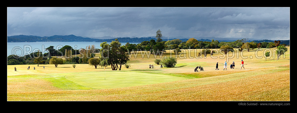 Image of Waitangi Golf Club over looking the Bay of Islands towards Russell. Panorama, Pahia, Bay of Islands, Far North District, Northland Region, New Zealand (NZ) stock photo image