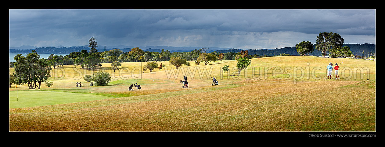 Image of Waitangi Golf Club over looking the Bay of Islands towards Russell. Panorama, Pahia, Bay of Islands, Far North District, Northland Region, New Zealand (NZ) stock photo image