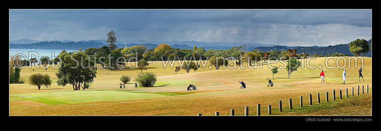 Image of Waitangi Golf Club over looking the Bay of Islands towards Russell. Panorama, Pahia, Bay of Islands, Far North District, Northland Region, New Zealand (NZ) stock photo image