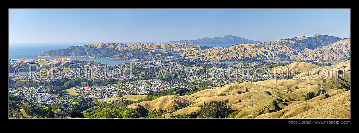 Image of Porirua City panorama. Cannons Creek, Porirua East, Aotea, Paremata, Plimmerton, Whitby, Pauatahanui Inlet, with Kapiti Island distant. From Belmont Regional Park, Porirua, Porirua City District, Wellington Region, New Zealand (NZ) stock photo image