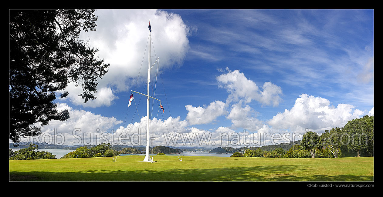 Image of Waitangi Treaty Grounds, Naval flagstaff standing where Te Tiriti o Waitangi (Treaty of Waitangi) was signed. Panorama, Waitangi, Bay of Islands, Far North District, Northland Region, New Zealand (NZ) stock photo image