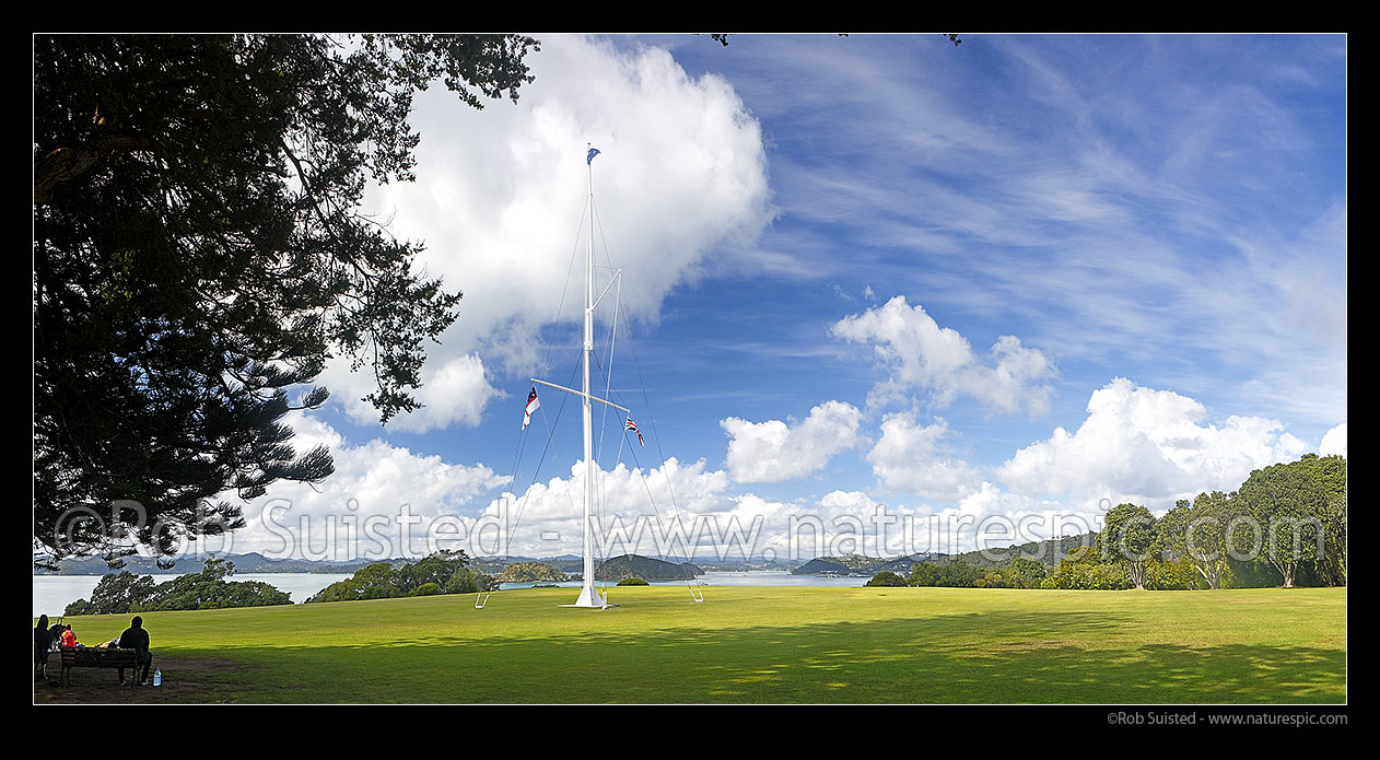 Image of Waitangi Treaty Grounds, Naval flagstaff standing where Te Tiriti o Waitangi (Treaty of Waitangi) was signed. Panorama, Waitangi, Bay of Islands, Far North District, Northland Region, New Zealand (NZ) stock photo image