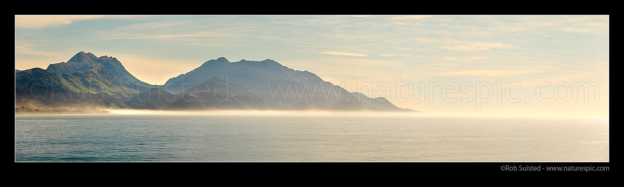 Image of Mt Alexander (1197m left), Seaward Valley, Mts Batty (1195m) and Patutu (1162m) (centre), to Clarence River, seen looking north from offshore of Kaikoura in morning light. Panorama, Kaikoura, Kaikoura District, Canterbury Region, New Zealand (NZ) stock photo image