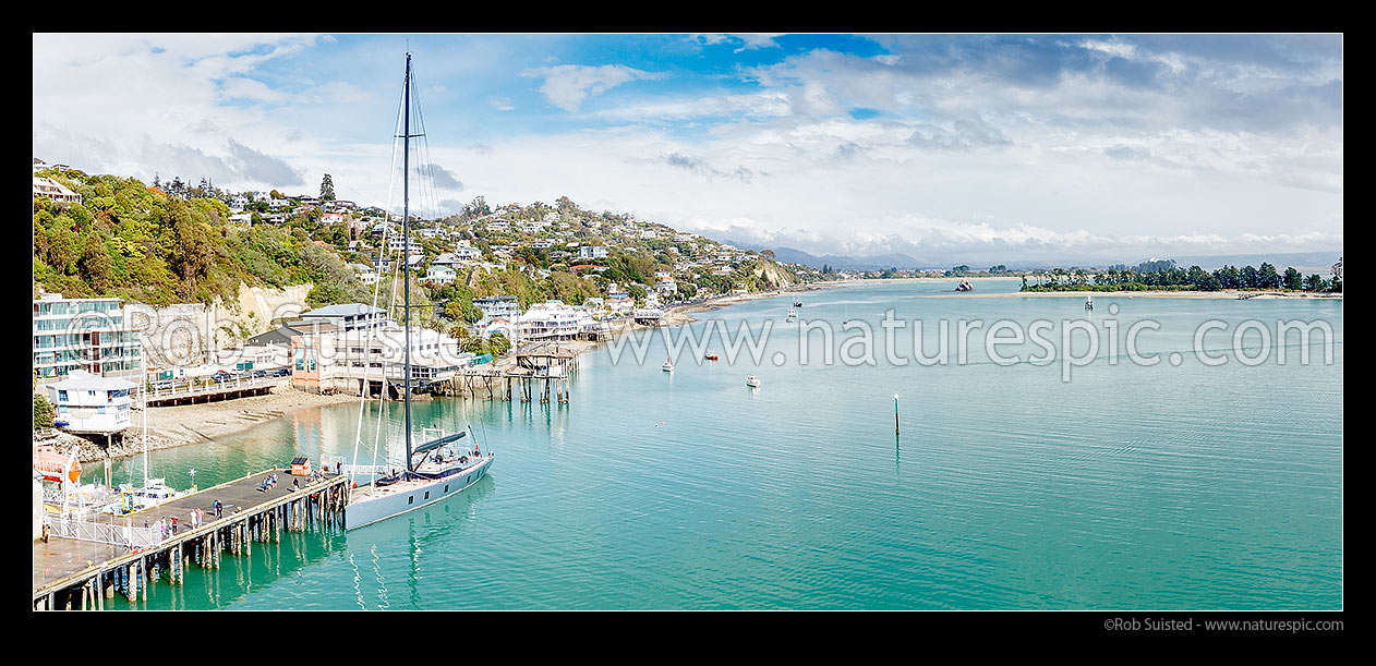 Image of Nelson waterfront with boat, wharves, restaurants, cafes, boast and yachts along Wakefield Quay. Haulashore Island at right. Panorama, Nelson, Nelson City District, Nelson Region, New Zealand (NZ) stock photo image