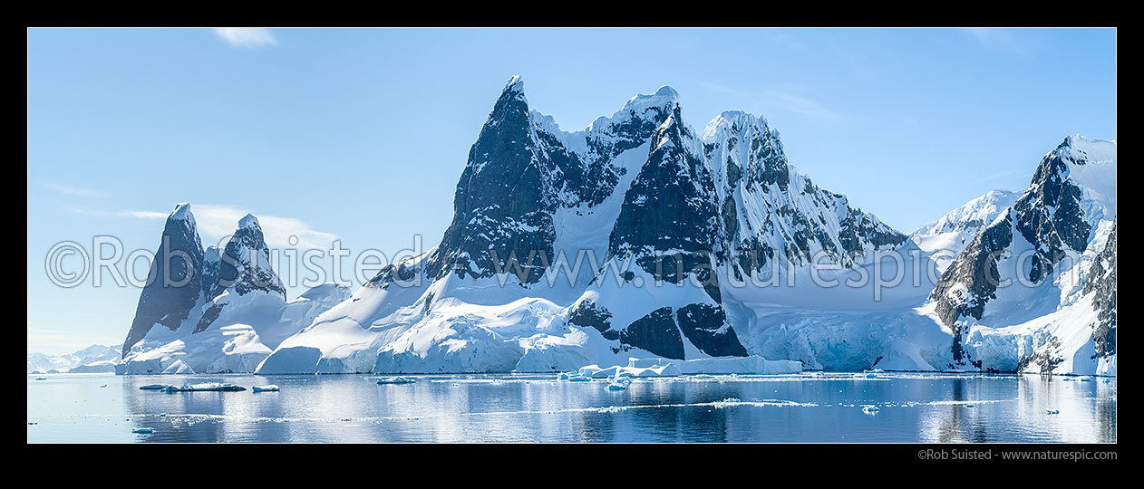 Image of Lemaire Channel, looking at stunning mountains of Graham Land. Una's Peaks at far left. Panorama, Antarctic Peninsula, Antarctica Region, Antarctica stock photo image