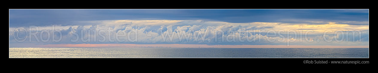 Image of Long white cloud (Aotearoa) over the moody Tasman Sea. Seen from Bruce Bay. Panorama, South Westland, Westland District, West Coast Region, New Zealand (NZ) stock photo image