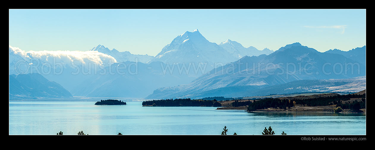 Image of Aoraki Mt Cook (3754m) above Lake Pukaki. Tasman Valley above Morgans Island.  Mt La Perouse (3078m) left, and Burnett Range right. Panorama, Aoraki / Mount Cook National Park, MacKenzie District, Canterbury Region, New Zealand (NZ) stock photo image