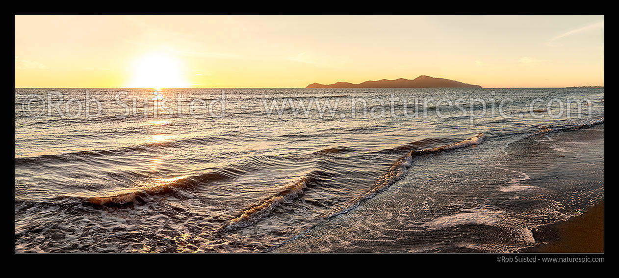 Image of Kapiti Island at sunset. Paekakariki's Whareroa Beach panorama, Paekakariki, Kapiti Coast District, Wellington Region, New Zealand (NZ) stock photo image