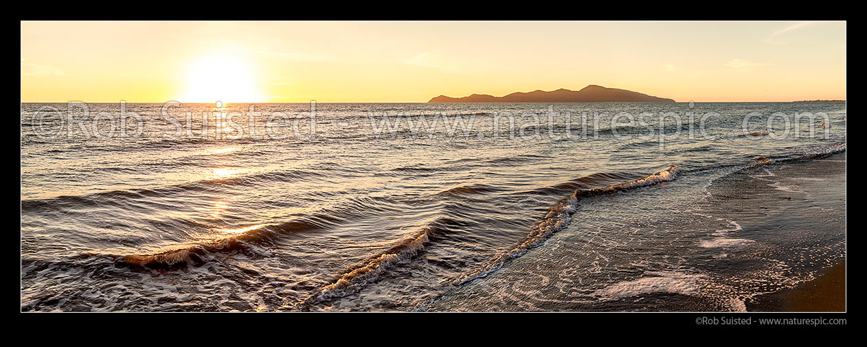 Image of Kapiti Island at sunset. Paekakariki's Whareroa Beach panorama, Paekakariki, Kapiti Coast District, Wellington Region, New Zealand (NZ) stock photo image