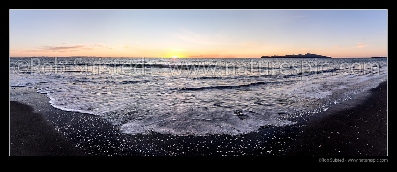 Image of Paekakariki Beach sunset panorama. South Island left distance, with Kapiti Island and Paraparaumu Beach at right, Paekakariki, Kapiti Coast District, Wellington Region, New Zealand (NZ) stock photo image