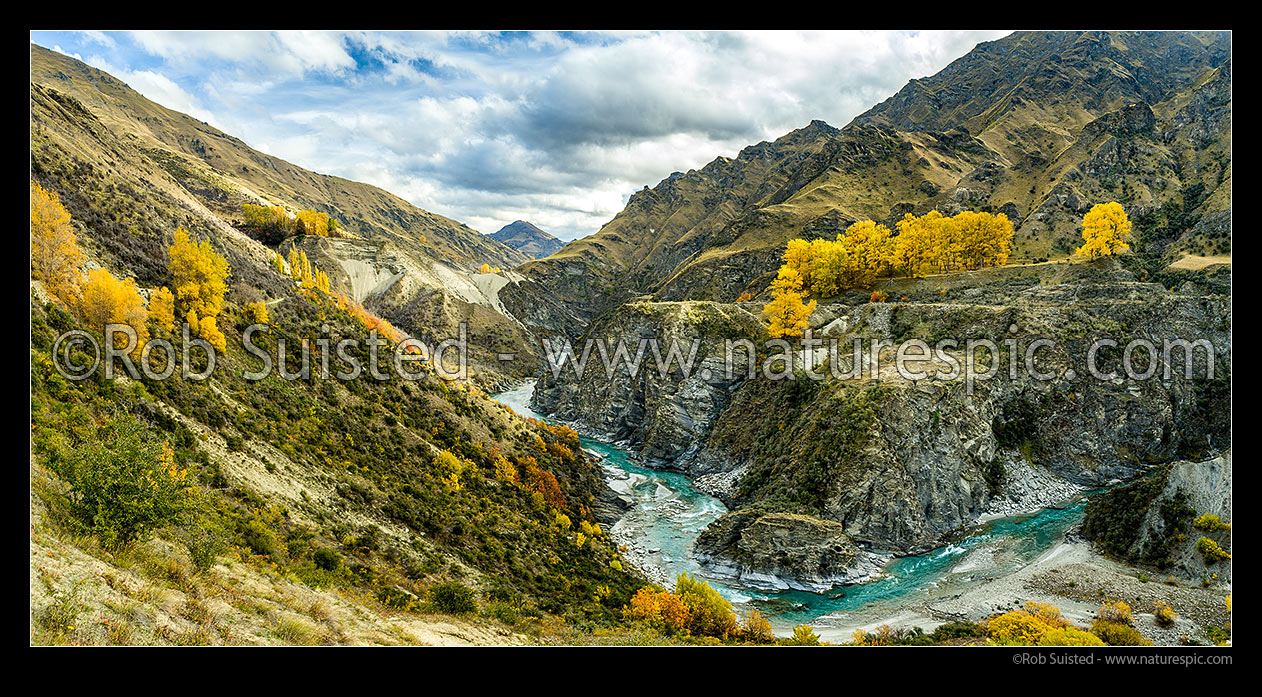 Image of Shotover River gorge above Skippers. Monks (Monck's) Terrace and old gold workings centre right. Sandhills Cut visible bottom right. Autumn colours panorama, Skippers, Queenstown Lakes District, Otago Region, New Zealand (NZ) stock photo image