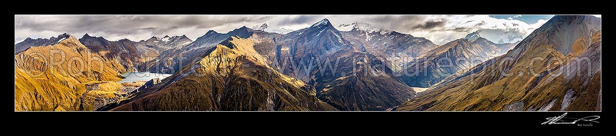 Image of Shotover River valley headwaters. Lochnagar left, Pine Creek centre, Junction Flat at right. Mt Tyndall (2496m) centre right, Tummel Burn and Rob Roy Peak far right. Panorama, Shotover River, Queenstown Lakes District, Otago Region, New Zealand (NZ) stock photo image