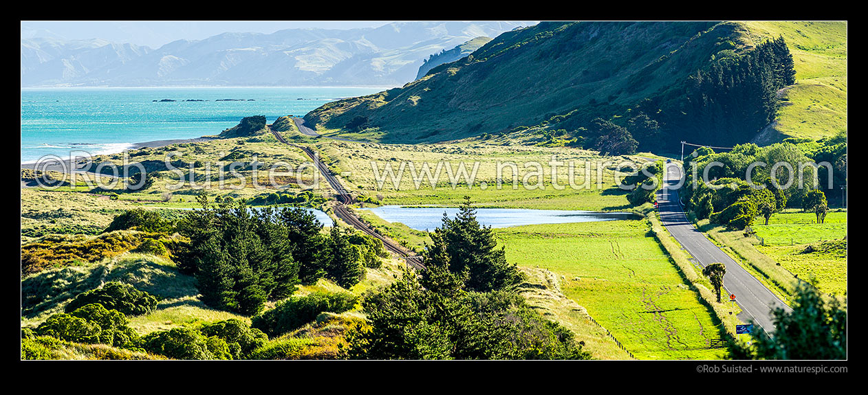 Image of Earthquake changed landscape. Kekerengu Fault ruptured 9 metres seaward through SH1, and previously flat and straight railway line, creating a dog leg and rise, and new wetland. M7.8 Kaikoura earthquake. Panorama, Tirohanga, Kekerengu, Kaikoura District, Canterbury Region, New Zealand (NZ) stock photo image