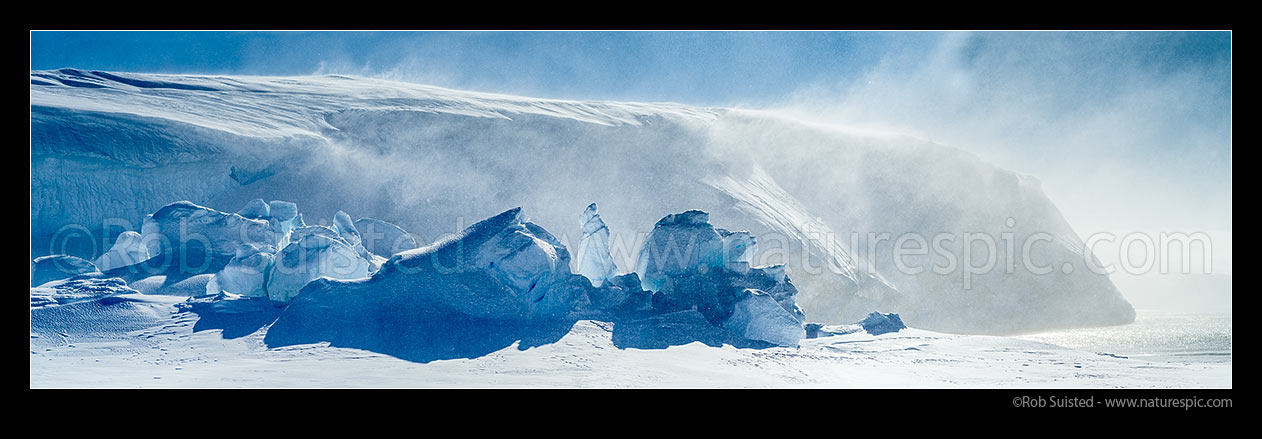 Image of Blizzard winds blowing spindrift snow and ice over pressure ridges during a catabatic storm blow of the Ross Ice Shelf. Panorama, Ross Sea, Antarctica Region, Antarctica stock photo image