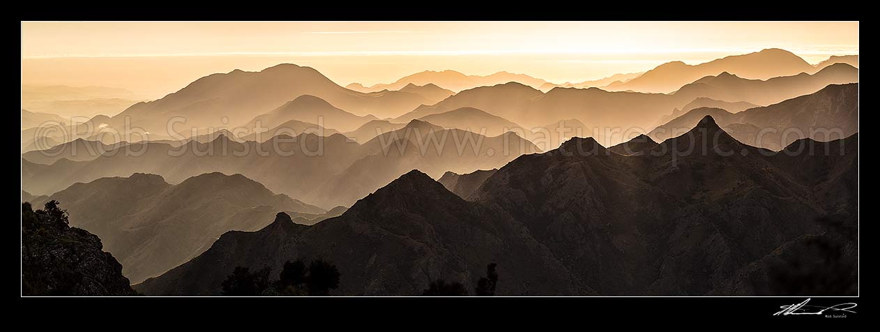 Image of Awatere Valley moody dawn showing ridgelines over Gladstone Downs Station, Camden, Hodder River, Cam and Isis Streams. Welds Hill (995m) left back. Panorama, Awatere Valley, Marlborough District, Marlborough Region, New Zealand (NZ) stock photo image