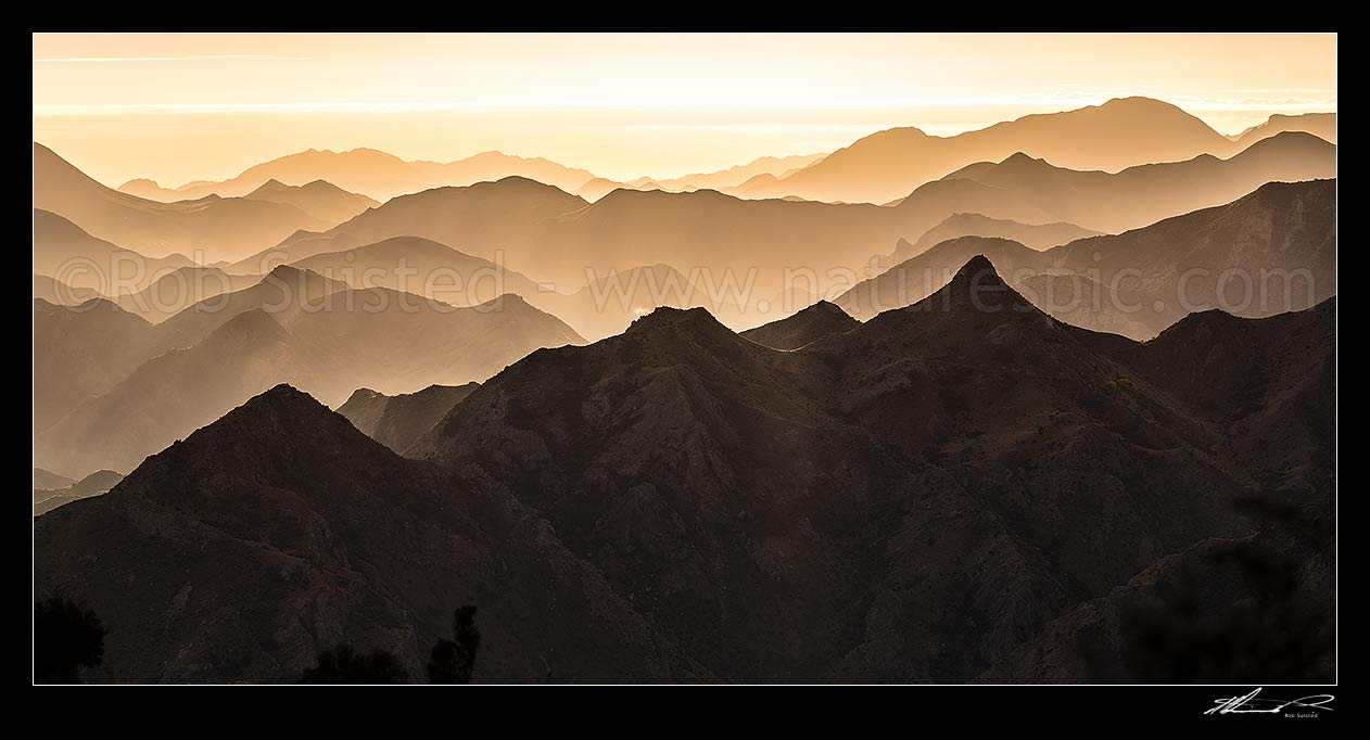 Image of Awatere Valley dawn, over the Hodder River, Cam Stream, Isis Stm, McRae Stream, Jordon River, towards coast. Gladstone Downs and Camden Stations. Panorama, Awatere Valley, Marlborough District, Marlborough Region, New Zealand (NZ) stock photo image