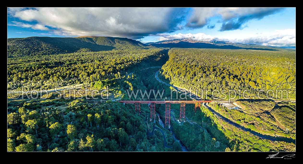 Image of Makatote Railway Viaduct (2262m long, 79m high, built 1908) over the Makatote River. Tongariro National Park and Mt Ruapehu beyond. Aerial panorama, Pokaka, Ruapehu District, Manawatu-Wanganui Region, New Zealand (NZ) stock photo image