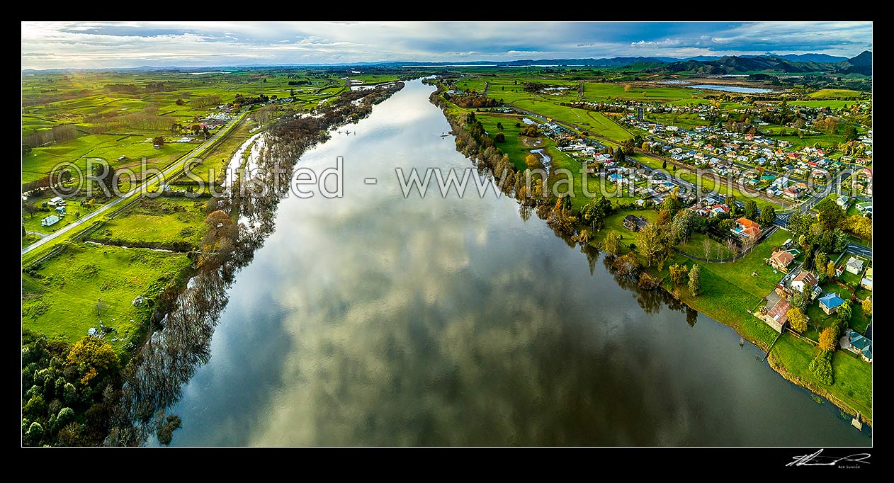 Image of Waikato River aerial panorama, looking north from Huntly. Lake Waikare in distance, Huntly, Waikato District, Waikato Region, New Zealand (NZ) stock photo image