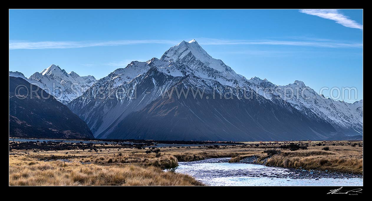 Image of Aoraki / Mount Cook (3754m) standing above the Tasman Valley. Hooker Valley and Southern Alps at left, Mt Cook Range centre, Tasman Glacier at right. Panorama, Aoraki / Mount Cook National Park, MacKenzie District, Canterbury Region, New Zealand (NZ) stock photo image