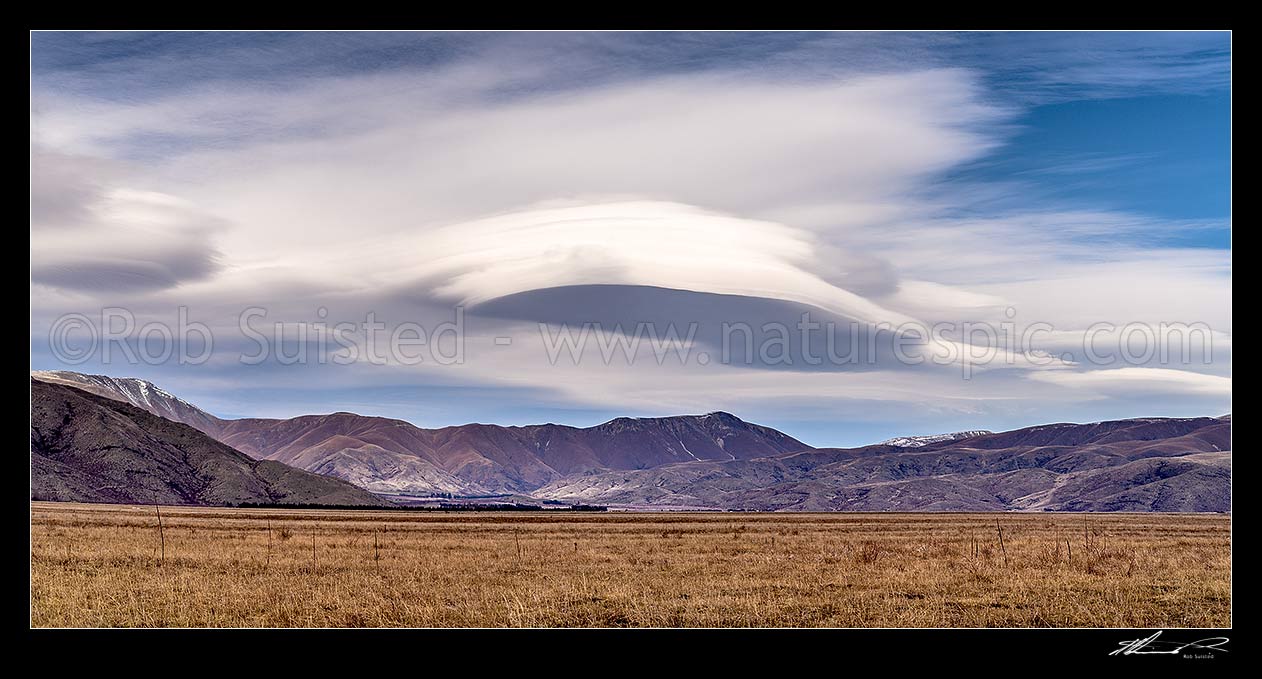 Image of Lenticular clouds (Altocumulus lenticularis) over the Cuthbert Range. Panorama, Omarama, Waitaki District, Canterbury Region, New Zealand (NZ) stock photo image