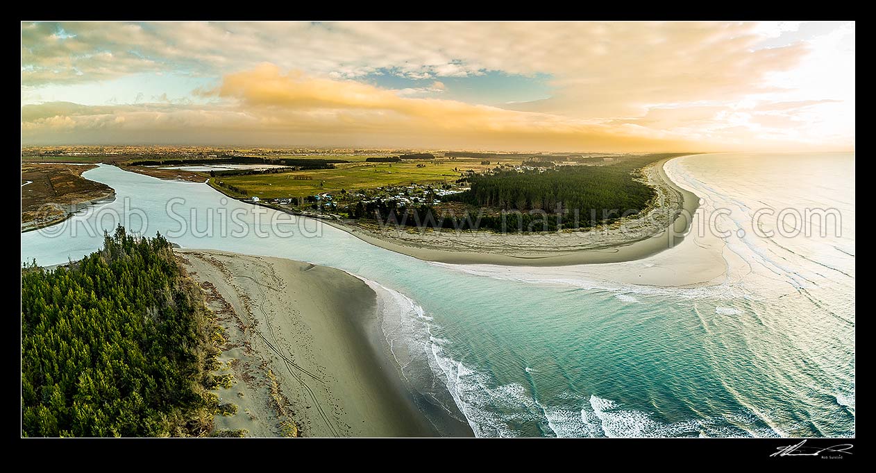 Image of Waimakariri River mouth, looking north over Kairakai and The Pines Beach. Aerial panorama at dawn, Kaiapoi, Waimakariri District, Canterbury Region, New Zealand (NZ) stock photo image