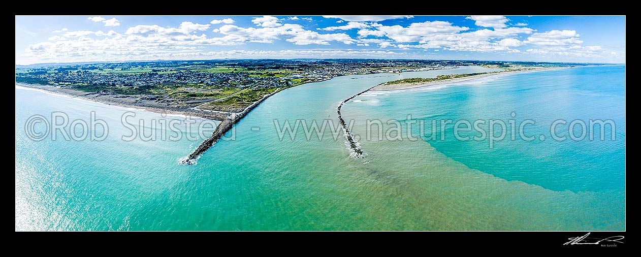 Image of Whanganui River mouth with north mole and mole jutting into the South Taranaki Bight. Whanganui city behind. Castlecliff beach left. Aerial panorama, Whanganui, Wanganui District, Manawatu-Wanganui Region, New Zealand (NZ) stock photo image