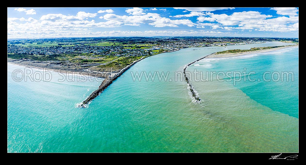 Image of Whanganui River mouth with north mole and mole jutting into the South Taranaki Bight. Whanganui city behind. Castlecliff beach left. Aerial panorama, Whanganui, Wanganui District, Manawatu-Wanganui Region, New Zealand (NZ) stock photo image