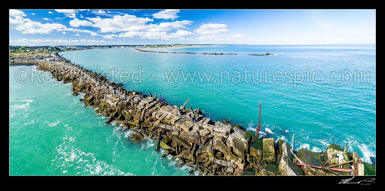 Image of Whanganui River mouth, looking over the North Mole, with fishermen seeking Kahawai fish. Aerial panorama, Whanganui, Wanganui District, Manawatu-Wanganui Region, New Zealand (NZ) stock photo image