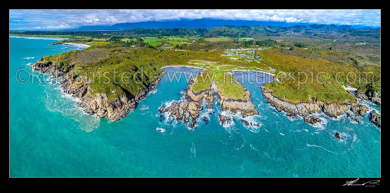 Image of Charleston coastline. Joyce Bay and Constant Bay centre, with Little Beach and Nine Mile Beach far left, Doctors Bay far right. Charleston township beyond. Aerial panorama, Charleston, Buller District, West Coast Region, New Zealand (NZ) stock photo image