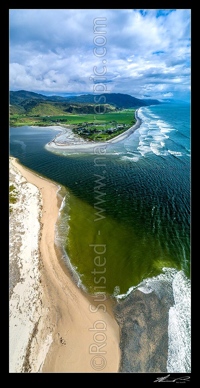 Image of Mokihinui River mouth, with Mokihinui township and Summerlea centre. Aerial vertical panorama view looking south along coast towards Hector, Mokihinui, Buller District, West Coast Region, New Zealand (NZ) stock photo image