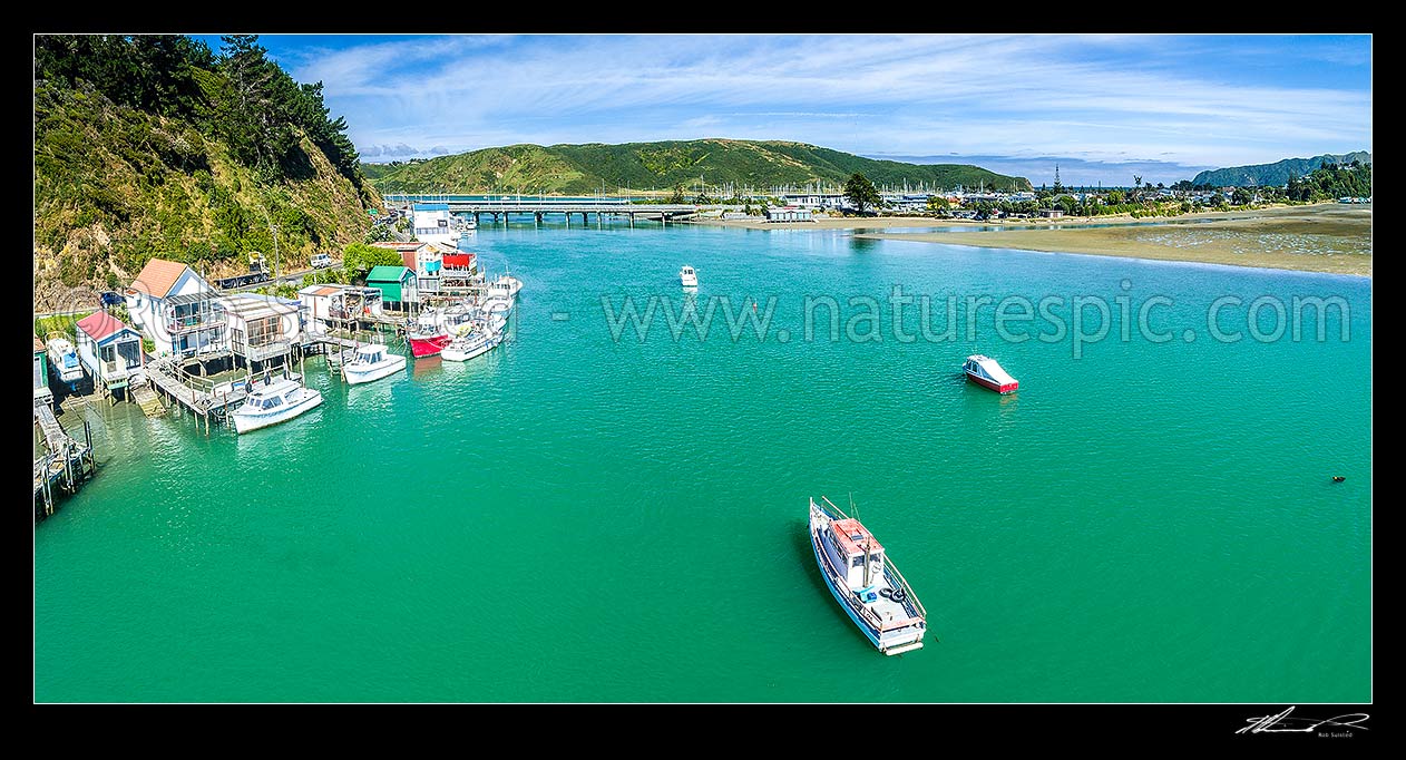 Image of Paremata boatsheds and boats in Pauatahanui Inlet on Porirua Harbour. Aerial panorama looking towards Mana marina and Titahi Bay, Paremata, Porirua City District, Wellington Region, New Zealand (NZ) stock photo image