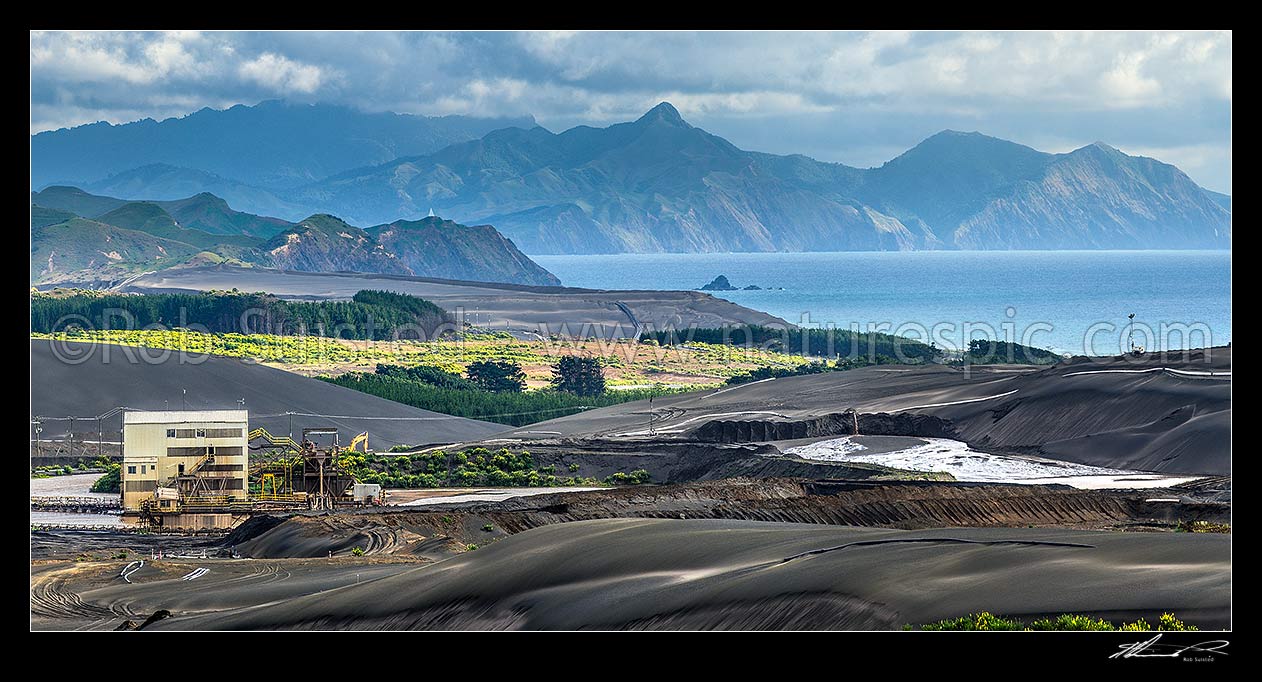 Image of Taharoa Ironsand mine operation owned by NZ Steel, mining iron rich ironsands. Panorama view with steep peak of Mt Whareorino (649m) behind, Taharoa, Waitomo District, Waikato Region, New Zealand (NZ) stock photo image