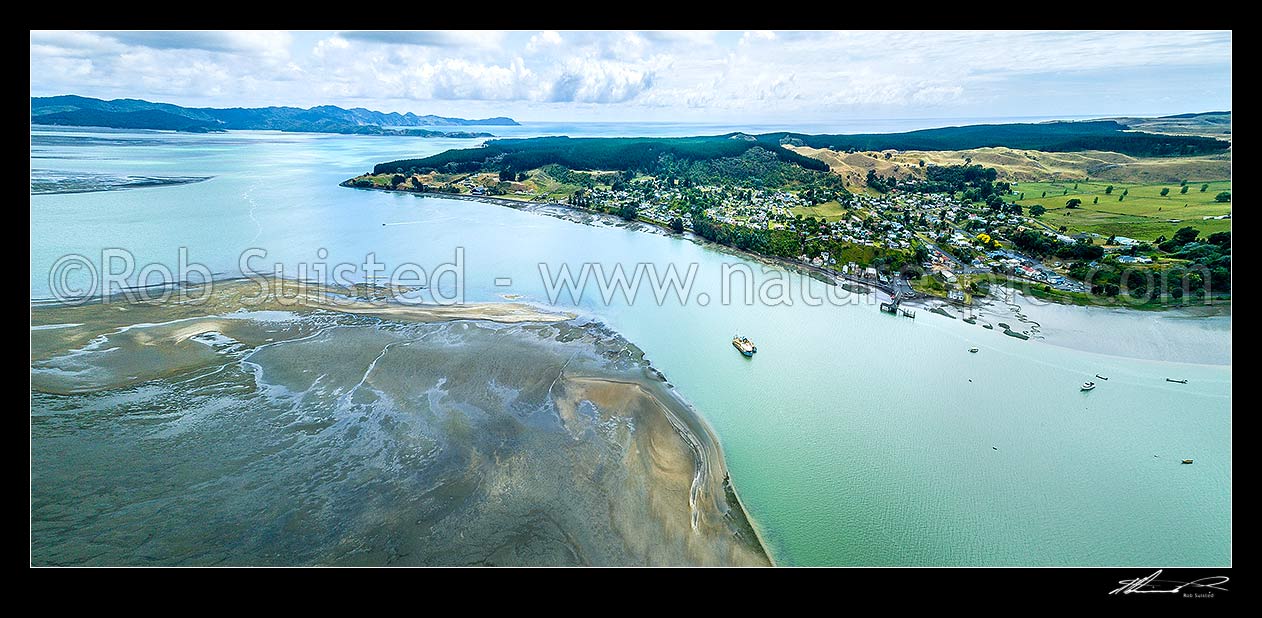 Image of Kawhia township and Karewa Beach on Kawhia harbour, with Te Maika Peninsula and Albatross Point distant left. Aerial panorama, Kawhia, Otorohanga District, Waikato Region, New Zealand (NZ) stock photo image