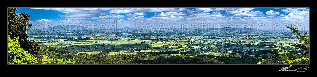 Image of Waikato Plains and farmland near Matamata, seen from the Kaimai Mamaku Ranges. Maungatautari Range and Ecological Island at left. Panorama, Kaimai Range, Matamata-Piako District, Waikato Region, New Zealand (NZ) stock photo image