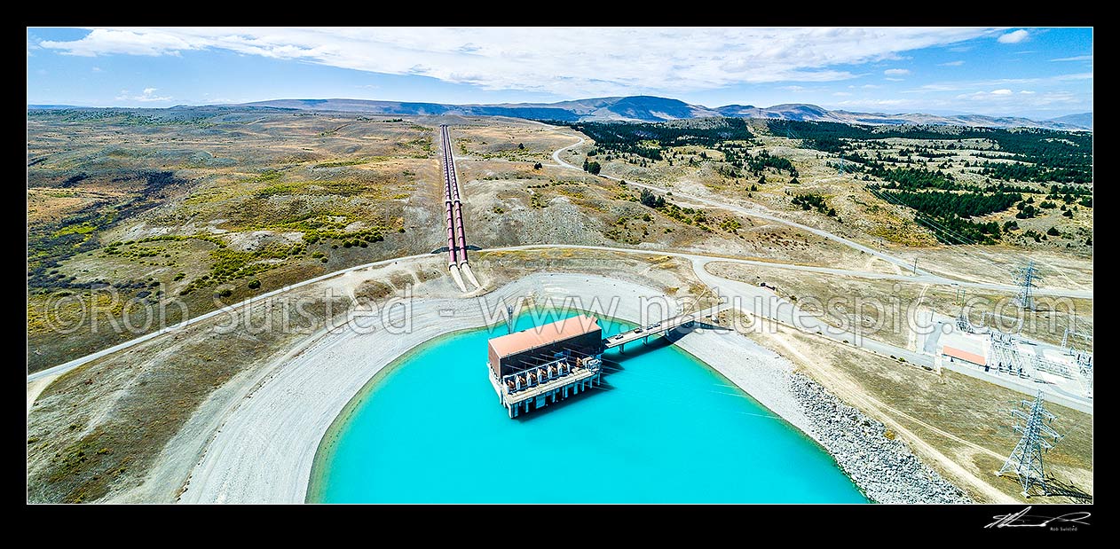 Image of Tekapo B (Pukaki) power station for hydroelectric power generation, fed by penstocks from the Tekapo Canal into Lake Pukaki, MacKenzie Basin. Aerial view, Lake Pukaki, MacKenzie District, Canterbury Region, New Zealand (NZ) stock photo image