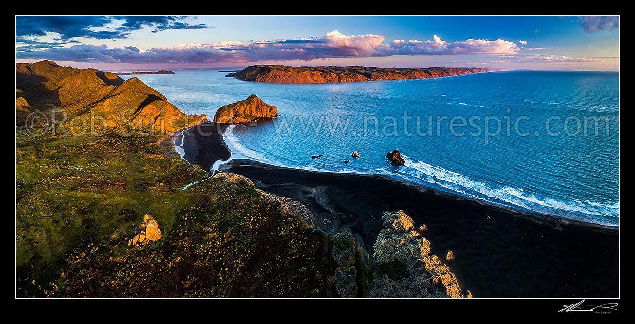 Image of Manukau Harbour entrance at Whatipu Beach, with Paratutae Island and Wonga wonga Bay centre left. Ninepin Rock centre right, South Head and Awhitu beyond. Aerial panorama at dusk, Whatipu Beach, Waitakere City District, Auckland Region, New Zealand (NZ) stock photo image