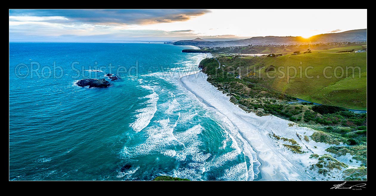 Image of Smaills Beach and Dunedin South Coast, looking past Bird Island, past Tomahawk Beach and Lawyers Head toward St Kilda. Aerial panorama, Otago Peninsula, Dunedin City District, Otago Region, New Zealand (NZ) stock photo image