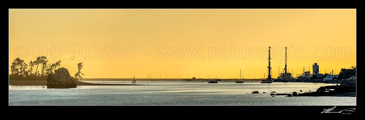 Image of Port Nelson and Nelson Haven at dawn on a calm autumn morning. Haulashore Island at left. Port far right. Panorama, Nelson, Nelson City District, Nelson Region, New Zealand (NZ) stock photo image