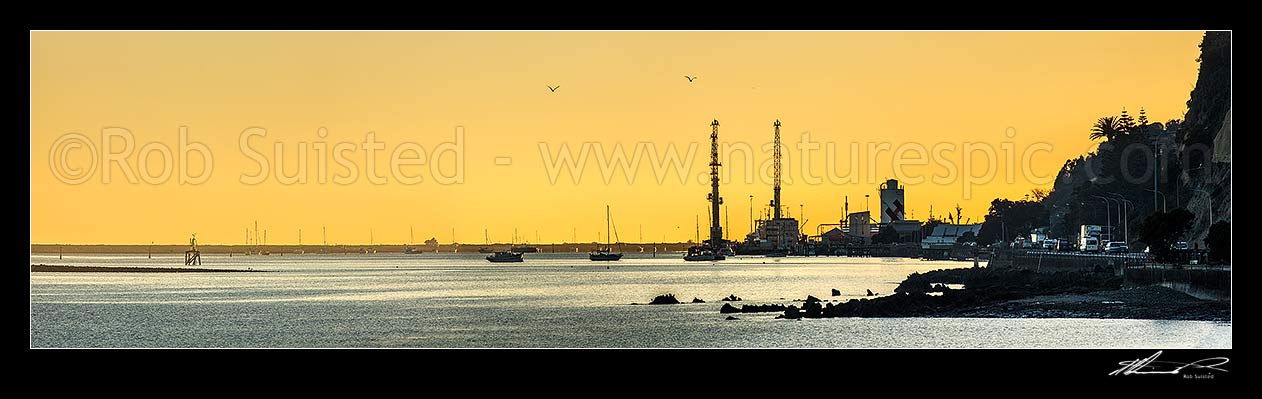 Image of Port Nelson and Nelson Haven at dawn on a calm autumn morning. Seen from Wakefield Quay. Panorama, Nelson, Nelson City District, Nelson Region, New Zealand (NZ) stock photo image