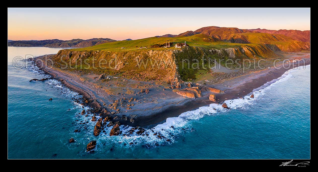 Image of Baring Head lighthouse aerial panorama with Fitzroy Bay at left. East Harbour Regional Park at dusk, Baring Head, Hutt City District, Wellington Region, New Zealand (NZ) stock photo image