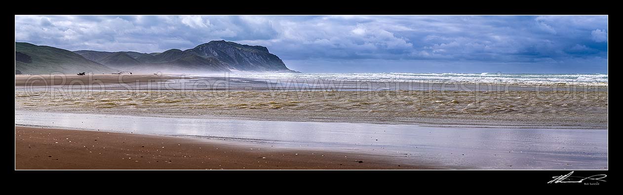 Image of Cape Turnagain, prominent headland off central Hawke's Bay, seen from Herbertville coast. Named by Captain James Cook in 1769 as the point he turned to head north. Panorama, Herbertville, Tararua District, Manawatu-Wanganui Region, New Zealand (NZ) stock photo image