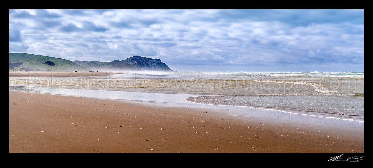 Image of Cape Turnagain, prominent headland off central Hawke's Bay, seen from Herbertville coast. Named by Captain James Cook in 1769 as the point he turned to head north. Panorama, Herbertville, Tararua District, Manawatu-Wanganui Region, New Zealand (NZ) stock photo image